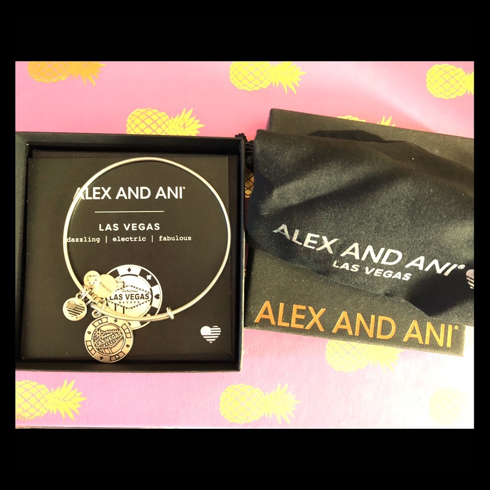 Alex and Ani Vegas charm bracelet with bag and box